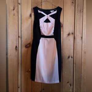 Black and pink crisscross dress.